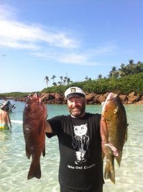 Man holding two fish caught off Pedasi, Azuero Peninsula, Panama – Best Places In The World To Retire – International Living